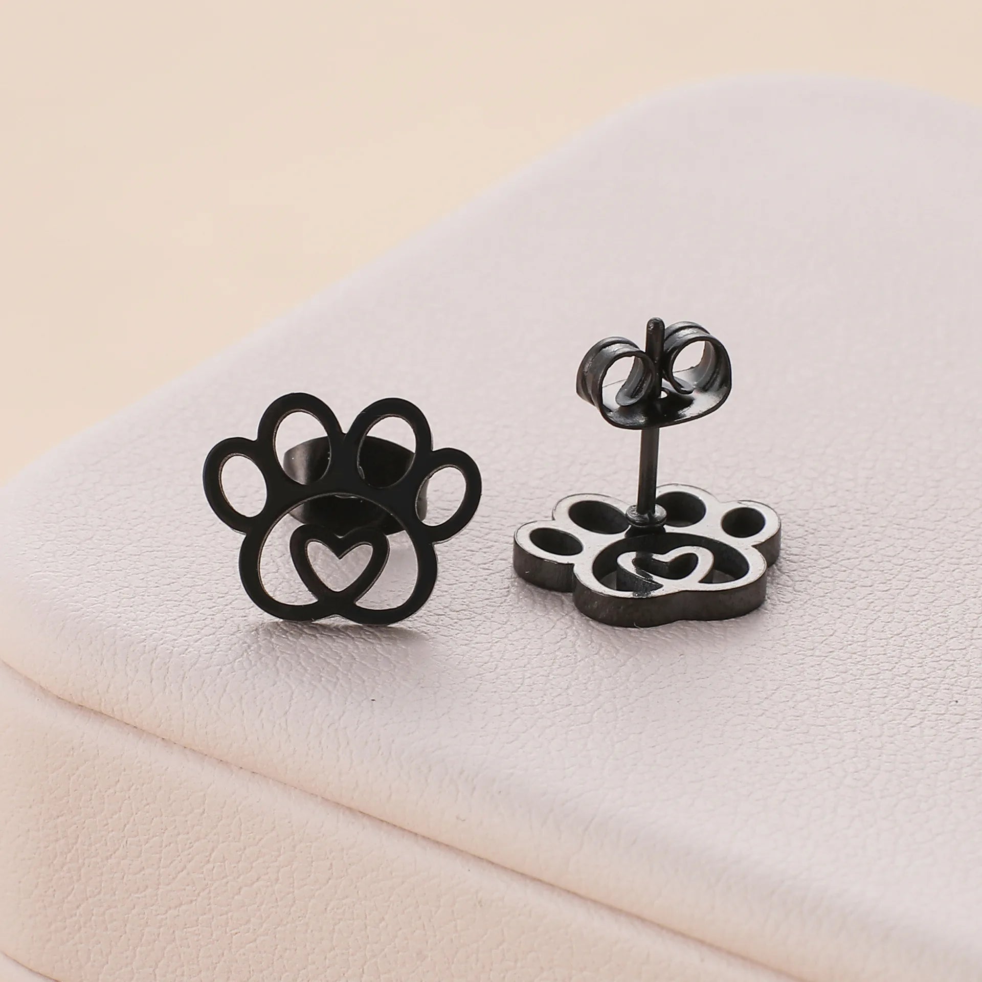 Stainless steel hollow footprint earrings - PeticaDeals