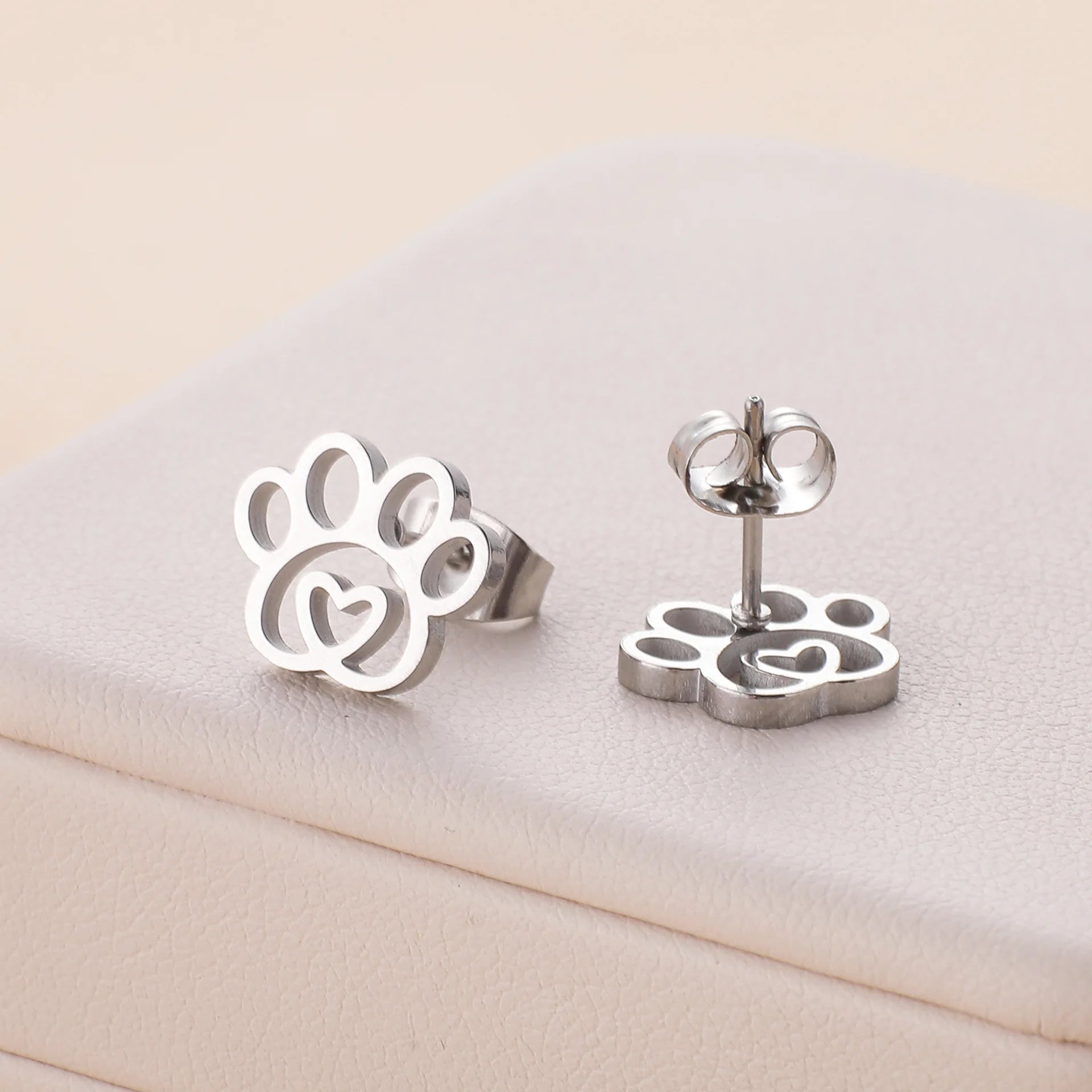 Stainless steel hollow footprint earrings - PeticaDeals